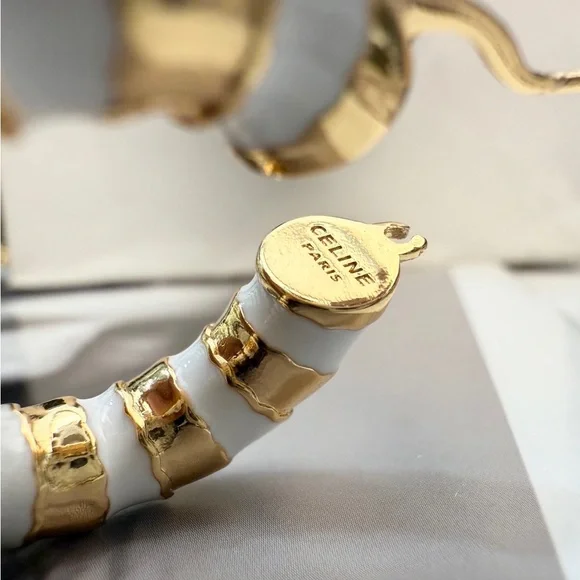 Women's Celine Gold & White Enamel Hoop Earrings for Modern Minimalist Chic - Picture 4 of 4
